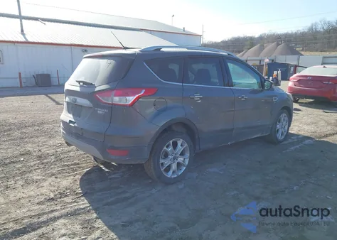 2016 Ford Escape Titanium z USA, uszkodzony, nr VIN 1FMCU9JX6GUA62390